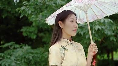 4K园林传统旗袍女性撑油纸伞赏景视频的预览图